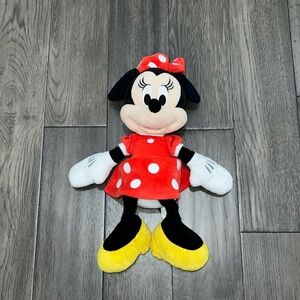 Minnie mouse stuffed animal with red polkadot dress